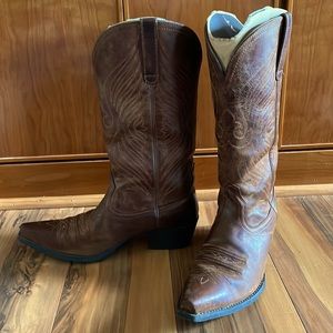 Ariat brown leather boots.